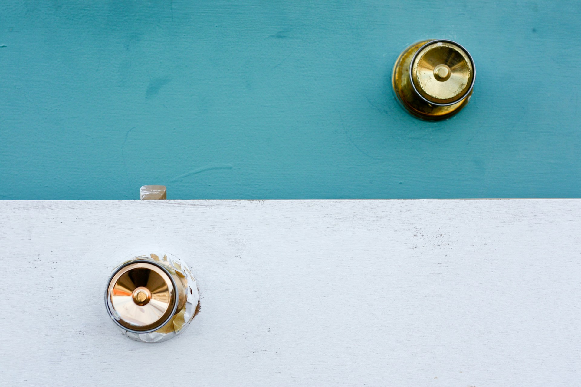 Two gold door knobs